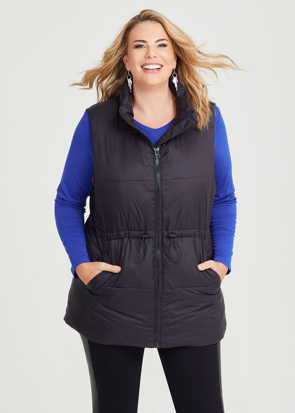 Shop Plus Size Mid Length Zip Puffer Vest in Black Taking Shape UK