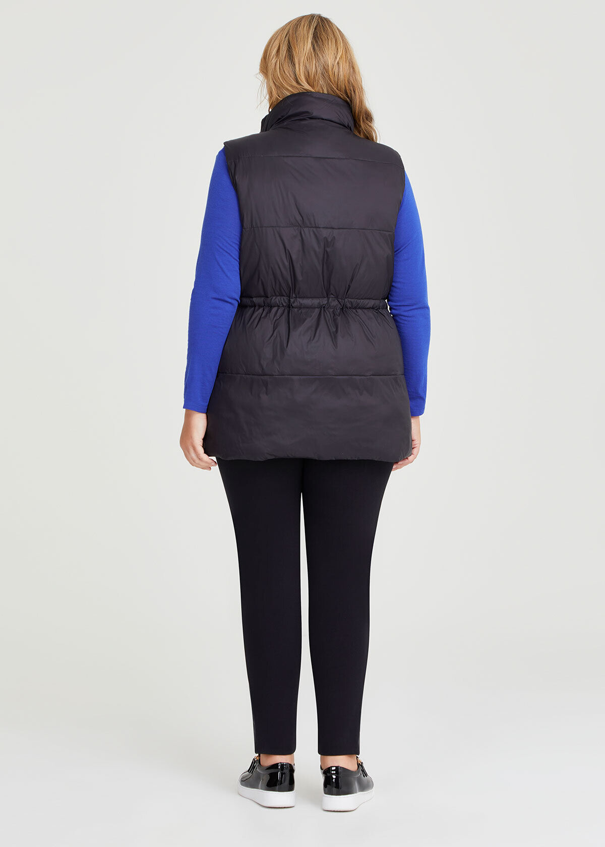 Shop Plus Size Mid Length Zip Puffer Vest in Black Taking Shape UK