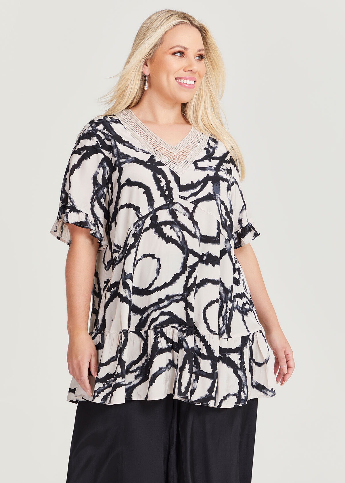 Shop Plus Size V neck Natural Ruffle Top in Black Taking Shape AU