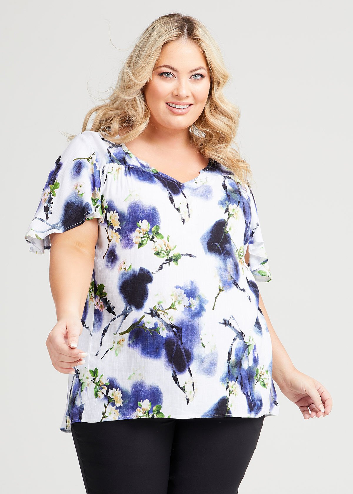 Shop Plus Size Floral Flutter Sleeve Top in Blue Taking Shape AU