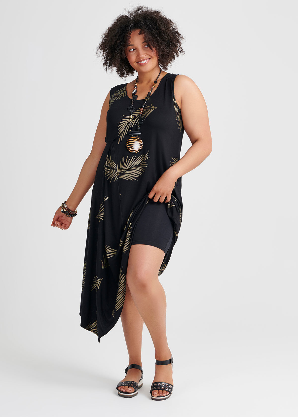 black dress with gold leaves