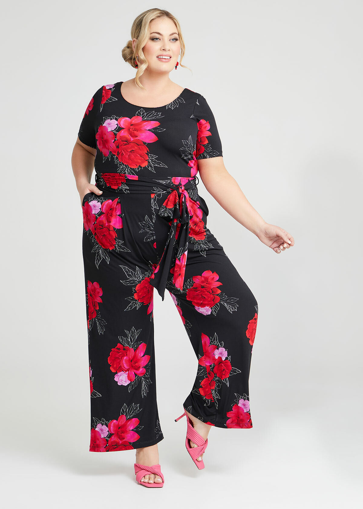 Shop Plus Size Elegant Floral Jumpsuit in Multi Taking Shape UK