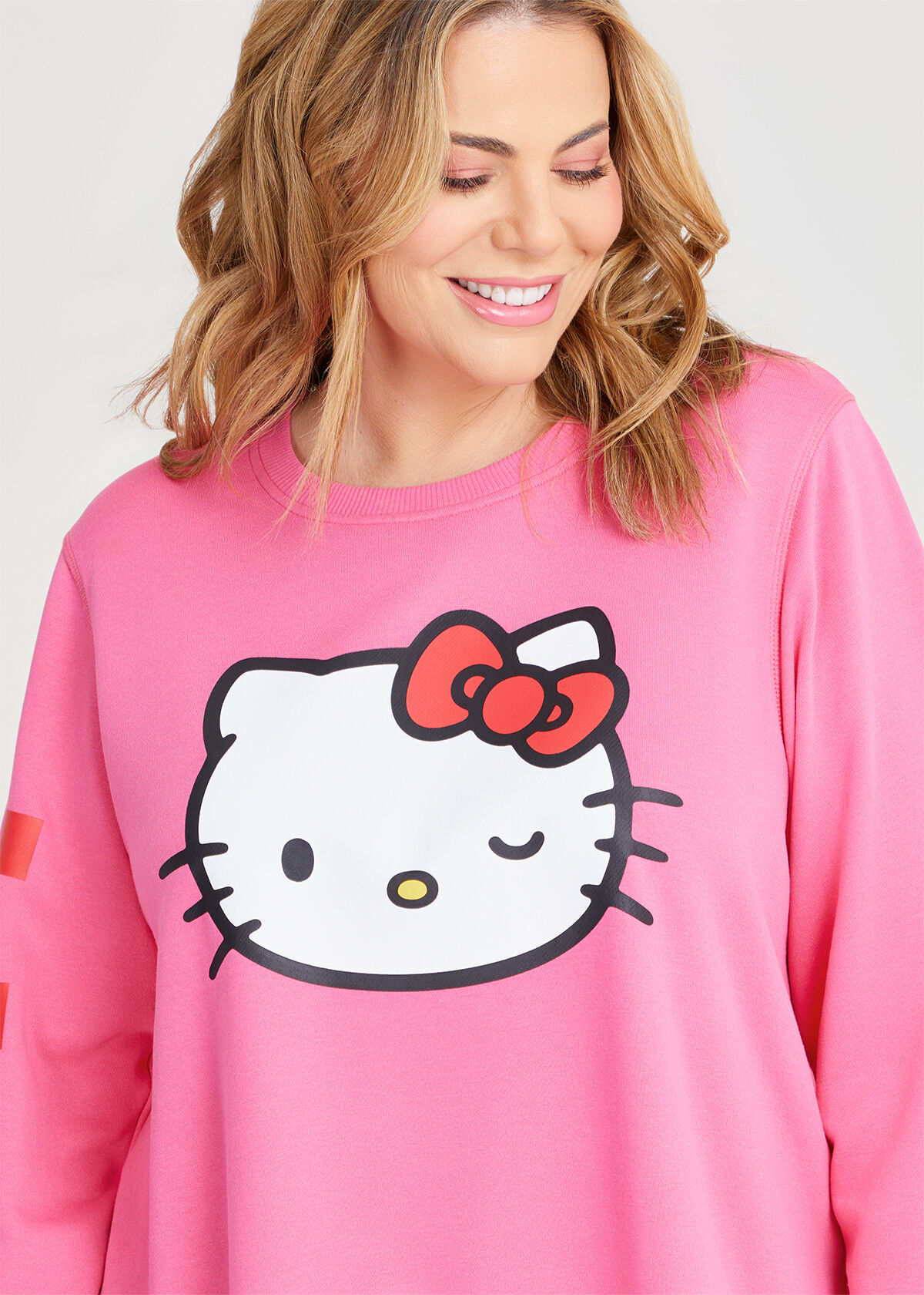 Shop Plus Size Hello Kitty Pink Sweatshirt in Red Taking Shape AU