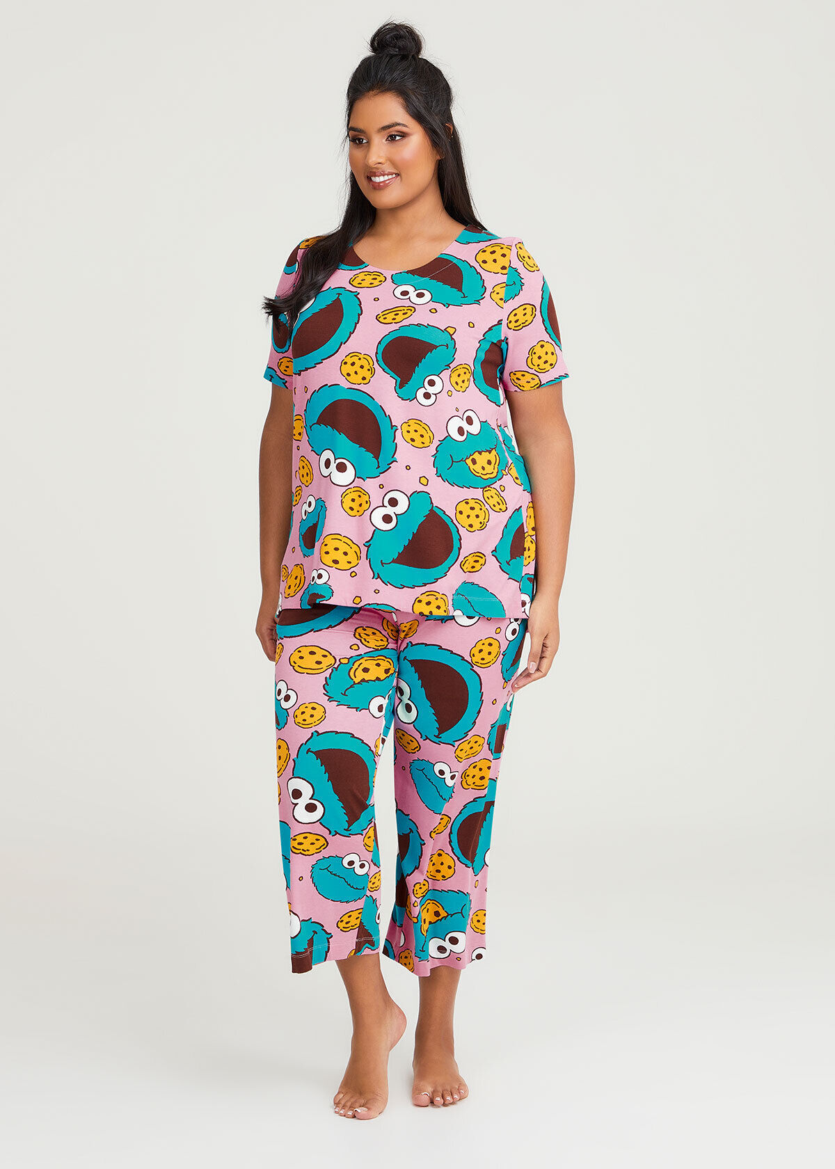 Shop Plus Size Cookie Monster Pyjama Top in Multi Taking Shape UK