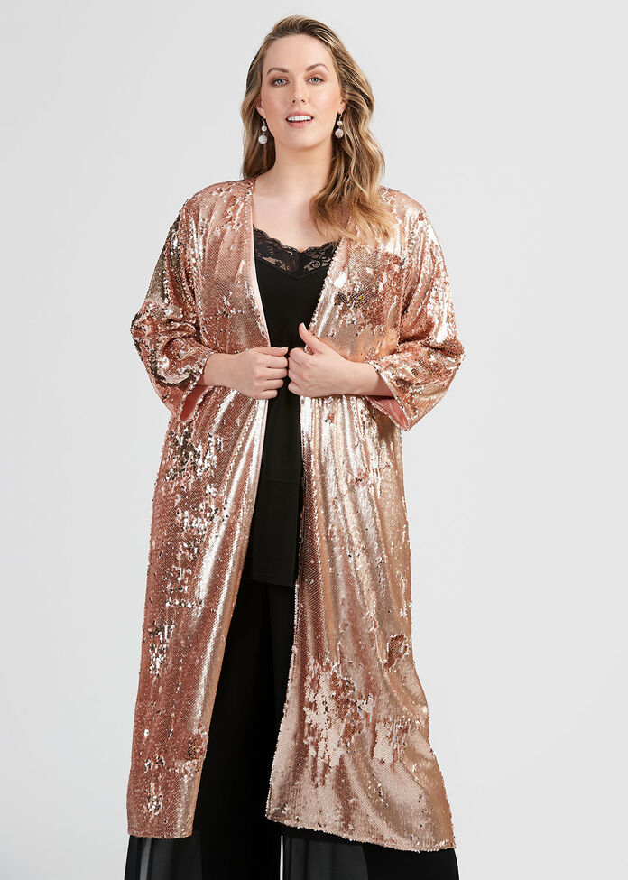 I caved and tried on Dunnes Stores sequin duster - it's perfect