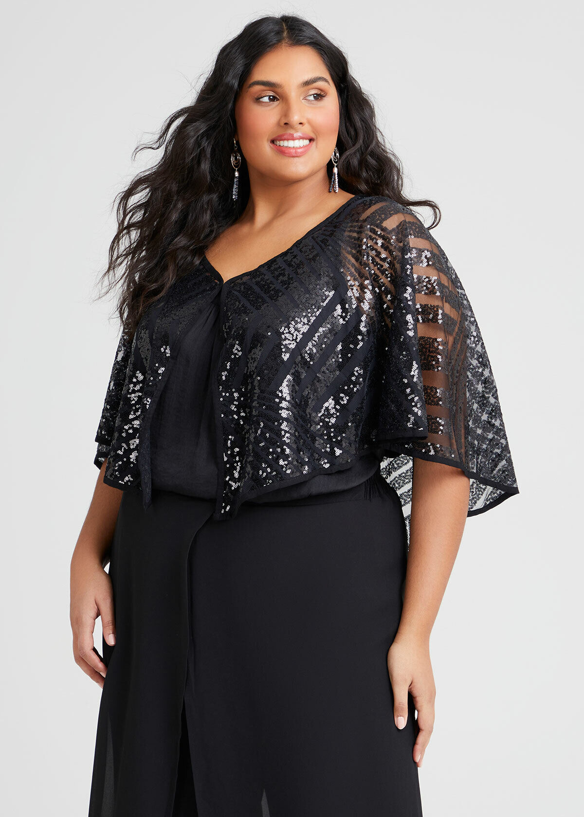 black sequin cape