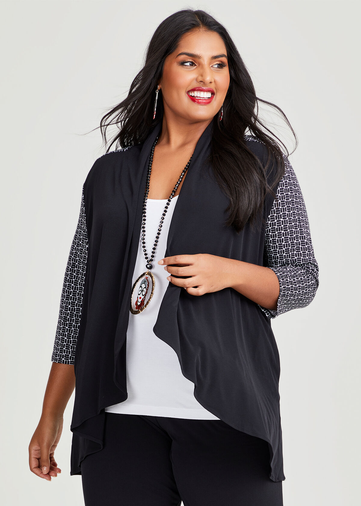 Long sleeveless hotsell cardigan plus size