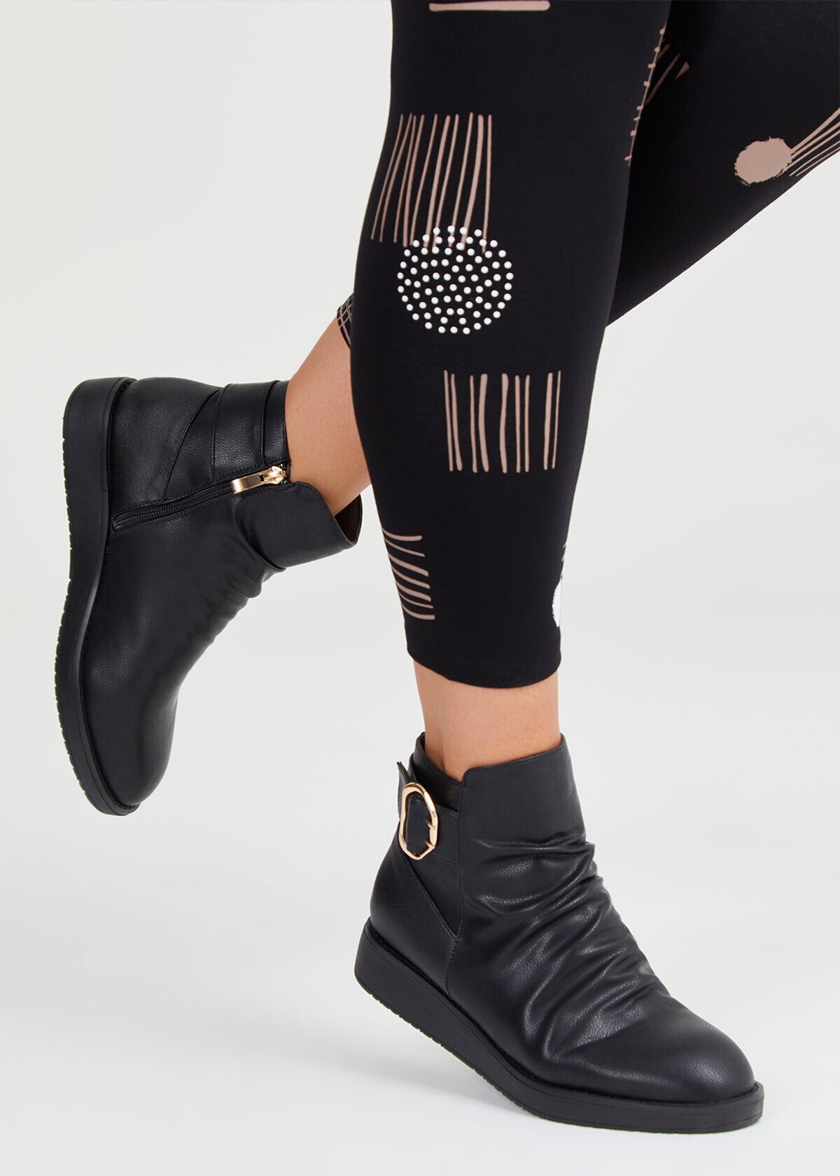 Buckle wedge boots top