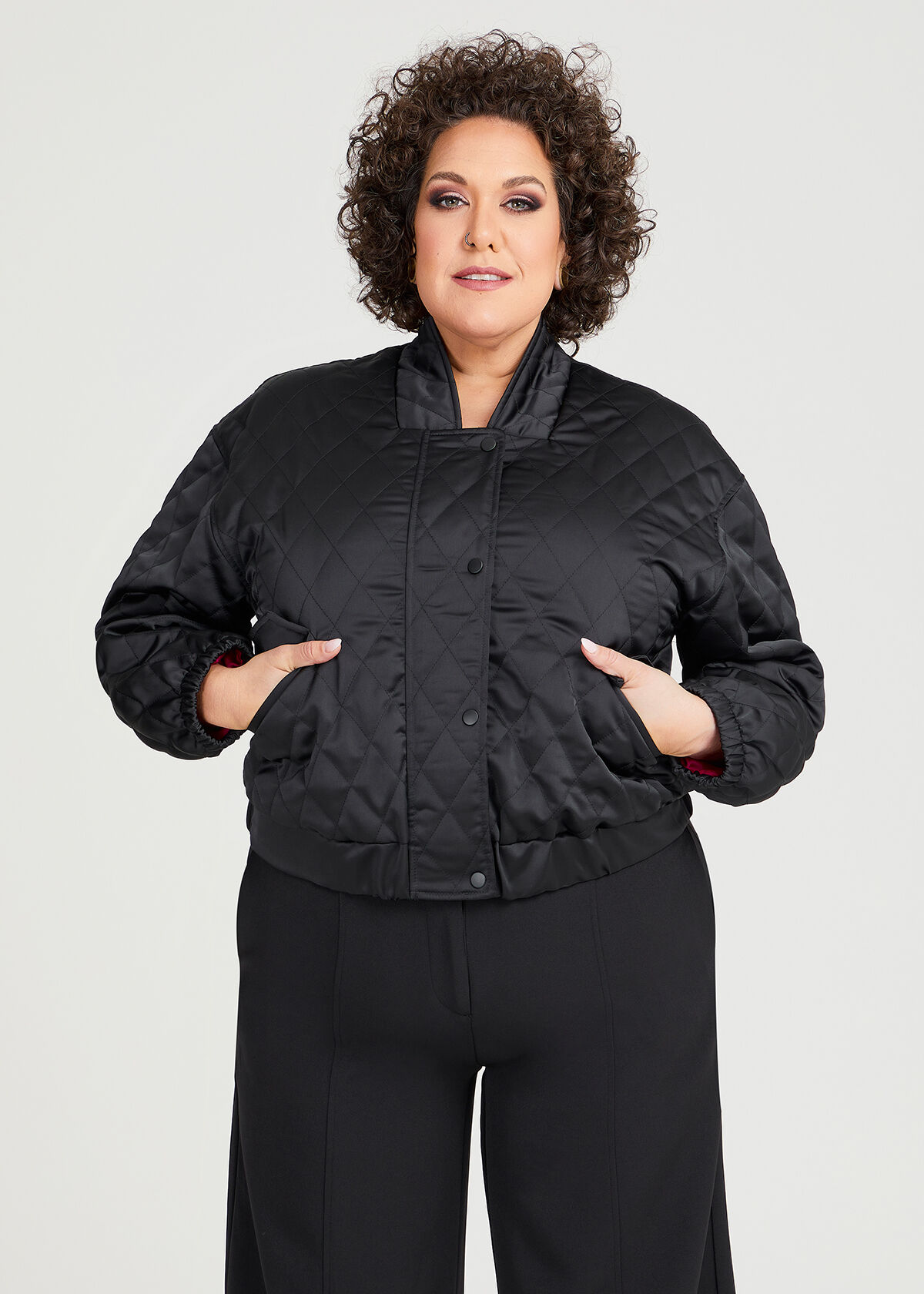 Shop Plus Size Satin Quilted Bomber Jacket in Black Sizes 12 30