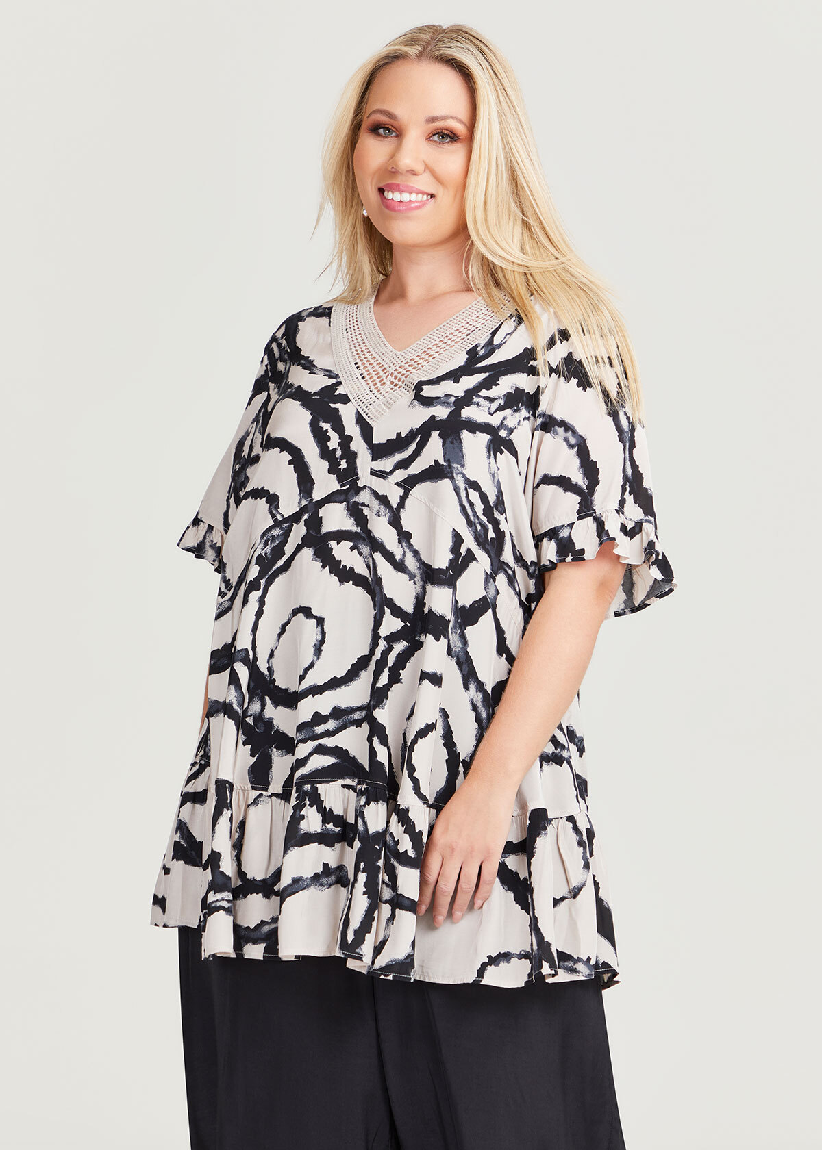 Shop Plus Size V-neck Natural Ruffle Top in Black | Taking Shape AU