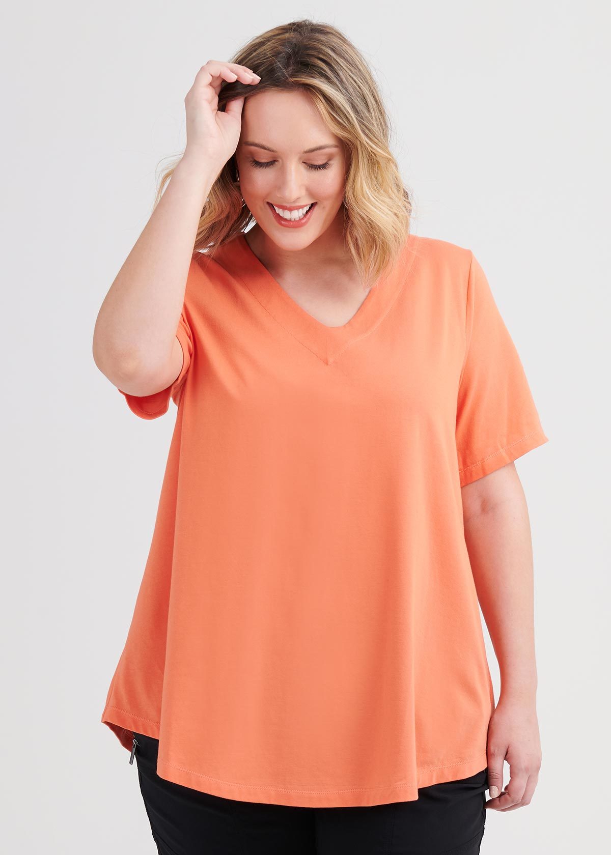 Shop Plus Size Organic V Neck Swing Basic Tee In Orange Taking Shape Au 0369